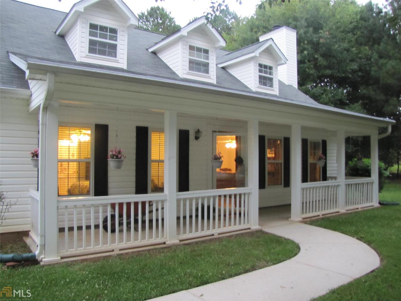 7333 Raleigh Way Bethlehem, GA 30620 - Photo 1 of 1 front view of a house with a porch