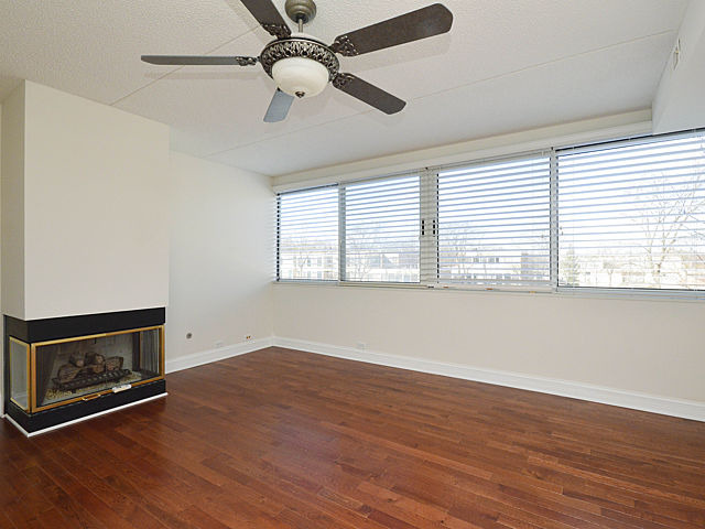 1724 Seton Road Northbrook, IL 60062 - Photo 8 of 19 wooden floor in an empty room with a window