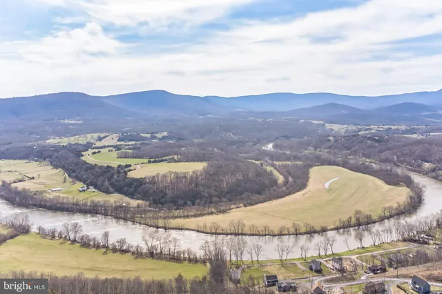 a view of a lake with mountain