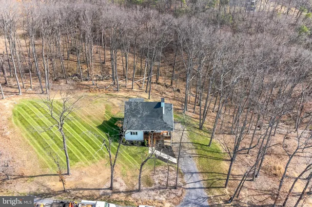 a view of swimming pool with a patio