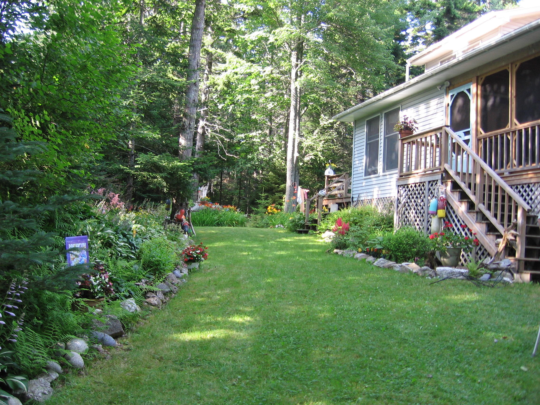 151 Snowball Hill Road Bristol, ME 04554 - Photo 2 of 26 side lawn with screen porch