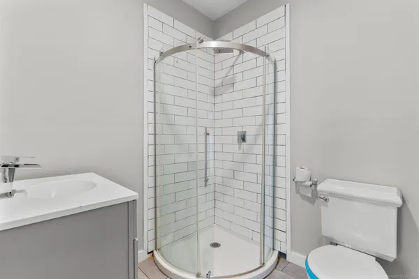 a bathroom with a toilet and a sink