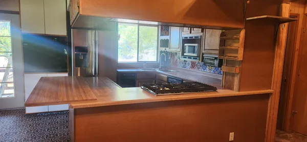 a view of kitchen and living room