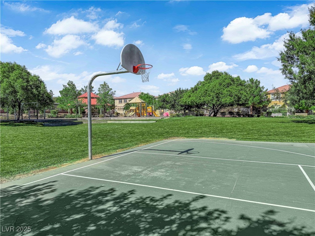 9005 Rendon Street Las Vegas, NV 89143 - Photo 45 of 51 View of sport court featuring a lawn and community basketball court