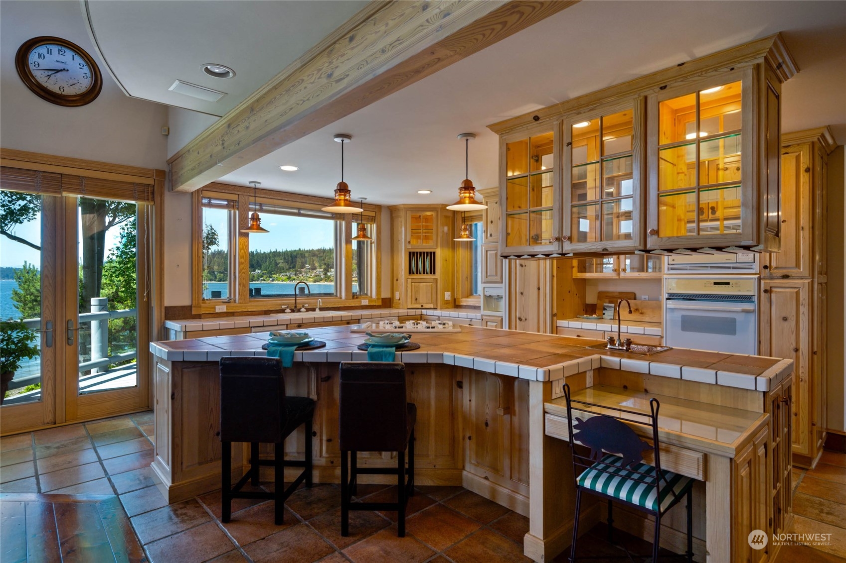 15215 Gibralter Road Anacortes, WA 98221 - Photo 13 of 40 a kitchen with a sink and a stove