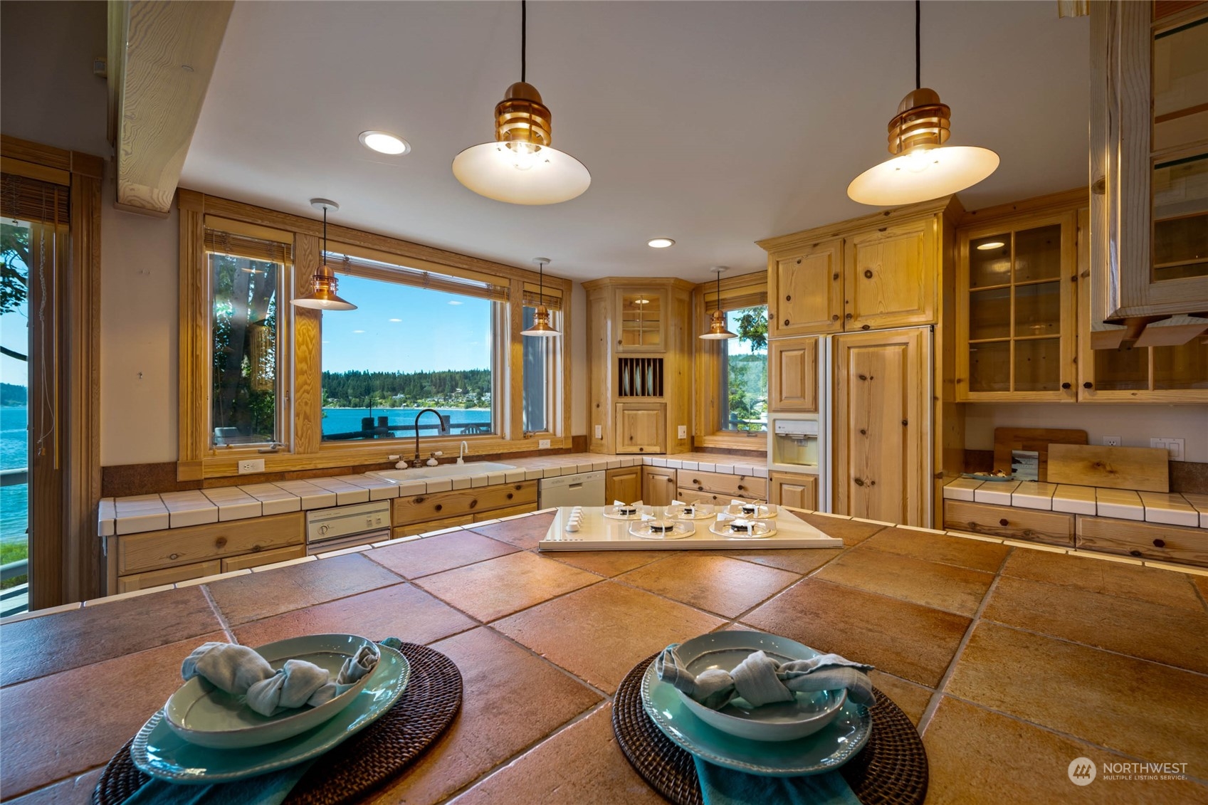 15215 Gibralter Road Anacortes, WA 98221 - Photo 18 of 40 a living room with furniture and a large window