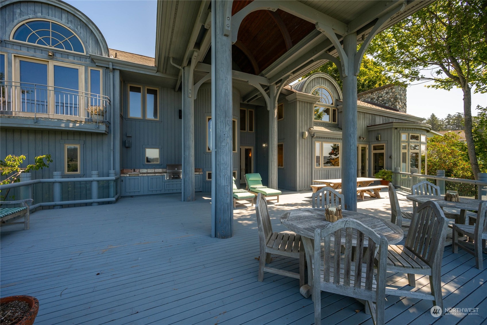 15215 Gibralter Road Anacortes, WA 98221 - Photo 36 of 40 a view of living room kitchen and deck