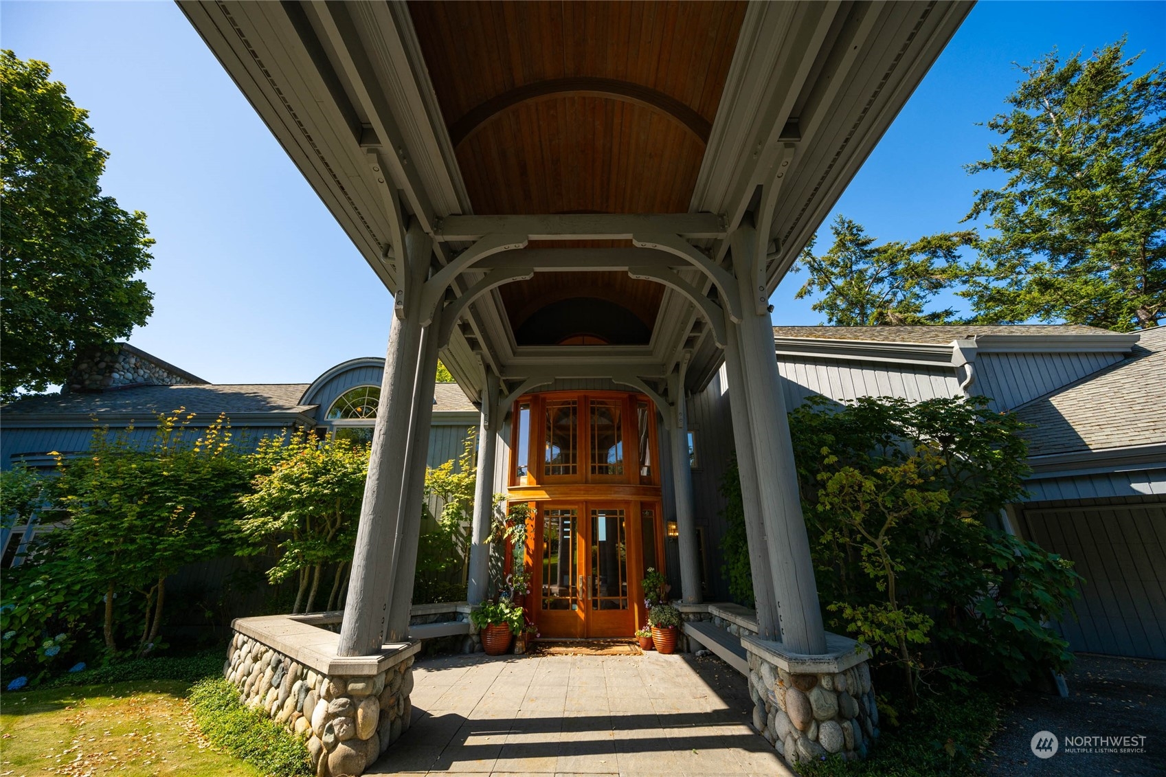 15215 Gibralter Road Anacortes, WA 98221 - Photo 9 of 40 a view of a two chairs in the balcony