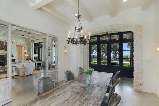 a kitchen with stainless steel appliances granite countertop a stove and a microwave