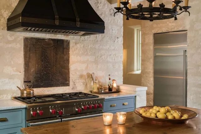 a bathroom with a sink a mirror and a window