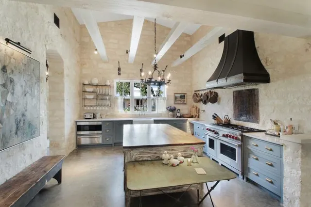 a bathroom with a sink toilet and window