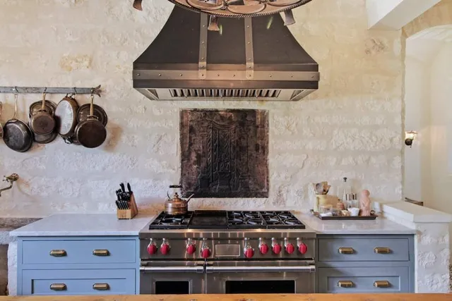 a spacious bedroom with a bed and a couch