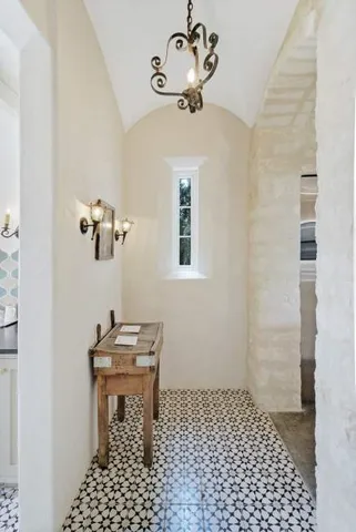 a bathroom with a sink double vanity and a mirror