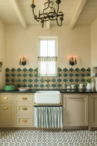 a living room with lots of furniture and baby crib