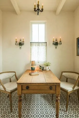 a living room with furniture and window