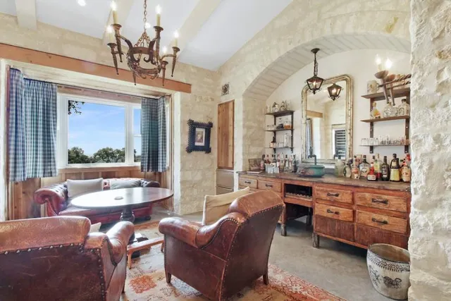 a huge green field with lots of trees