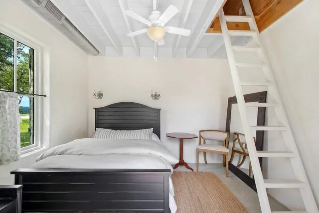 an aerial view of residential building with ocean view