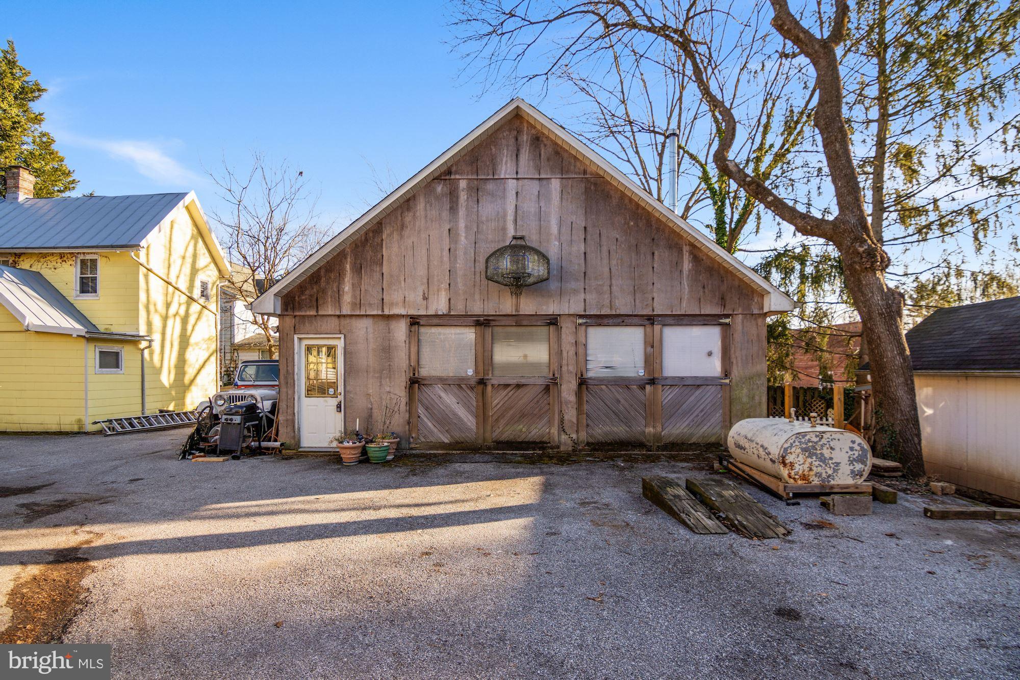 4801 Butler Road Glyndon, MD 21136 - Photo 67 of 80 Oversized Two car garage, half bath & laundry area