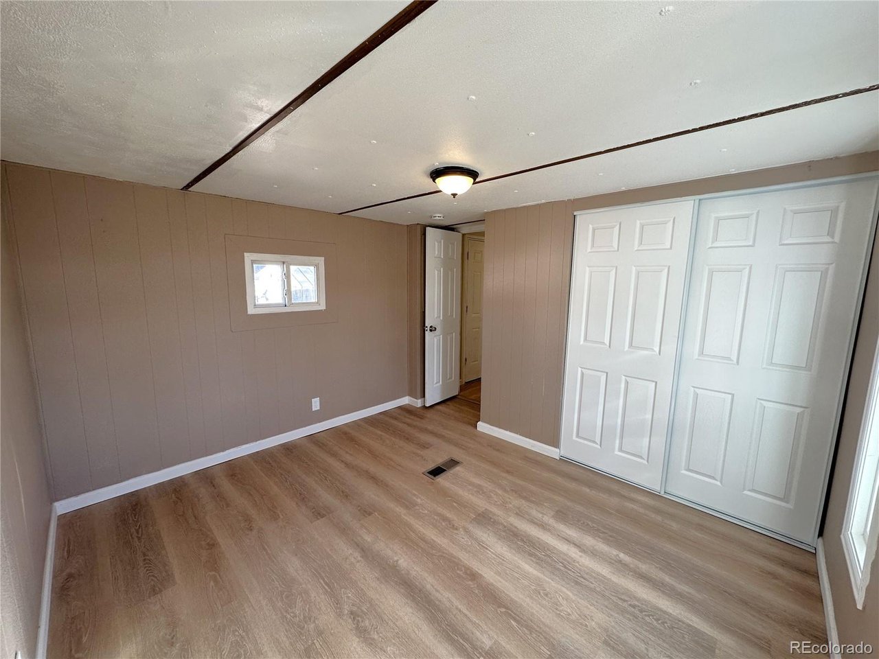 155 Indiana Avenue Limon, CO 80828 - Photo 16 of 27 a view of an empty room with a window