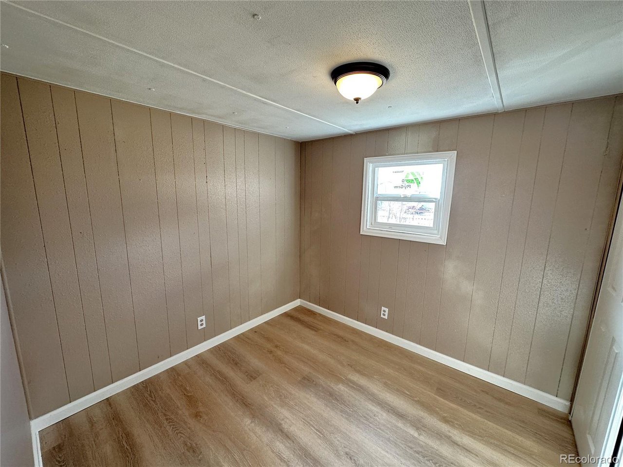 155 Indiana Avenue Limon, CO 80828 - Photo 20 of 27 a view of an empty room and window
