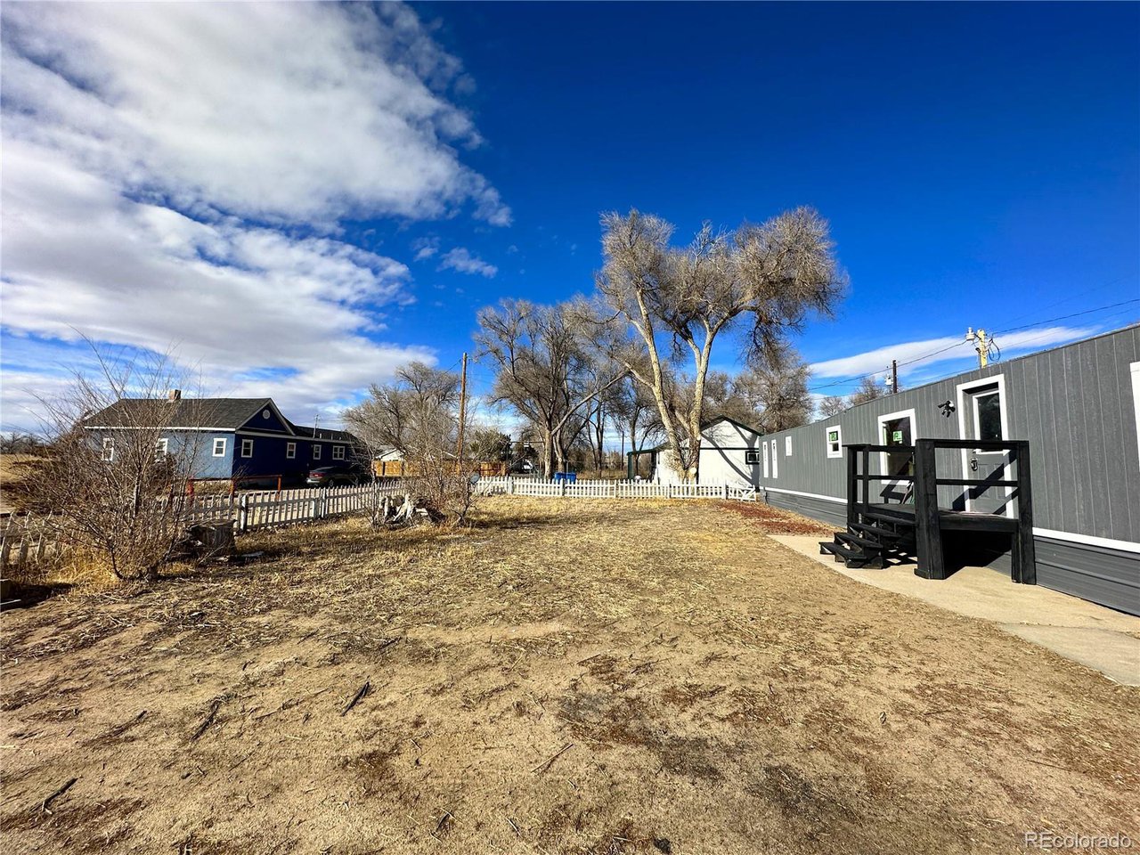 155 Indiana Avenue Limon, CO 80828 - Photo 23 of 27 a view of a yard with snow on the road