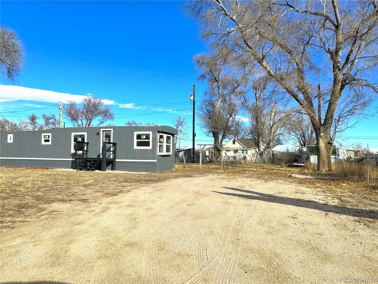 155 Indiana Avenue Limon, CO 80828 - Photo 27 of 27 a view of a house with snow on the road