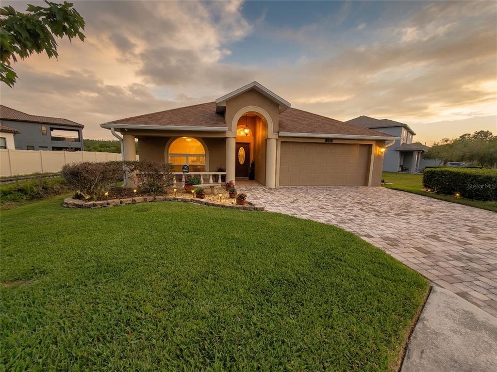 1001 Torreya Way Odessa, FL 33556 - Photo 1 of 44 a house view with a garden space