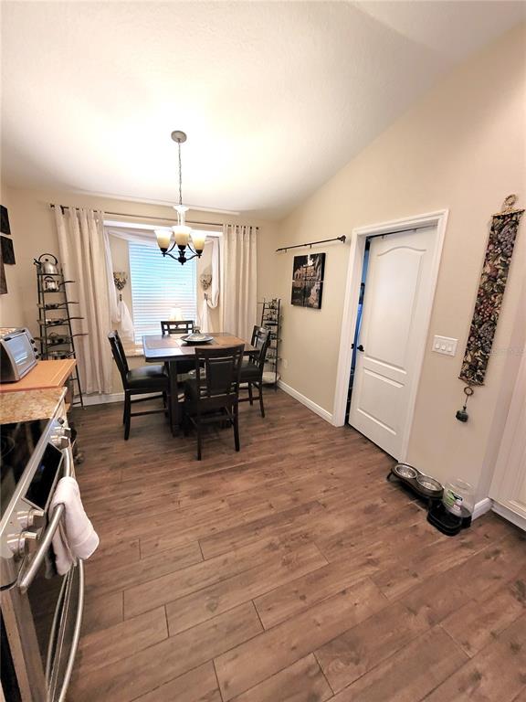 1001 Torreya Way Odessa, FL 33556 - Photo 13 of 44 a view of a workspace with furniture window and wooden floor
