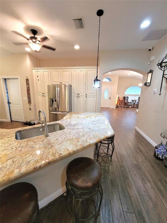 1001 Torreya Way Odessa, FL 33556 - Photo 17 of 44 a kitchen with a table and chairs