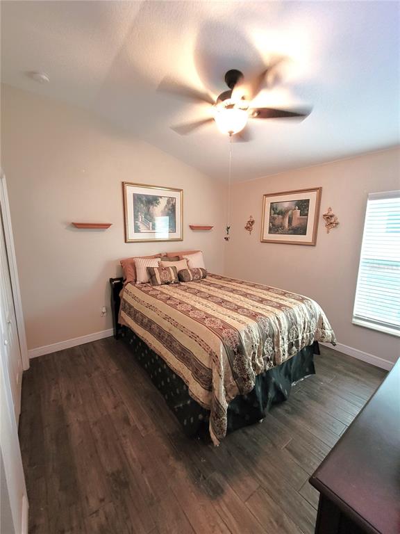 1001 Torreya Way Odessa, FL 33556 - Photo 19 of 44 a bedroom with a bed and a window