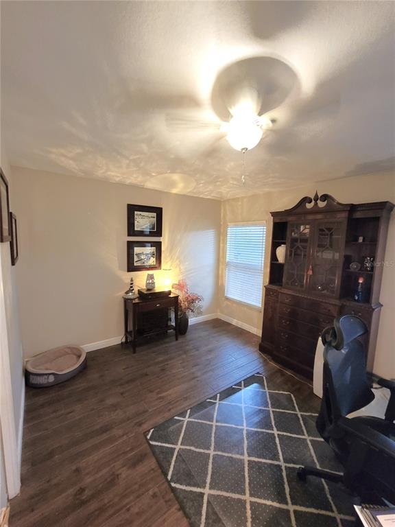 1001 Torreya Way Odessa, FL 33556 - Photo 28 of 44 a living room with furniture a air conditioner vent and a window
