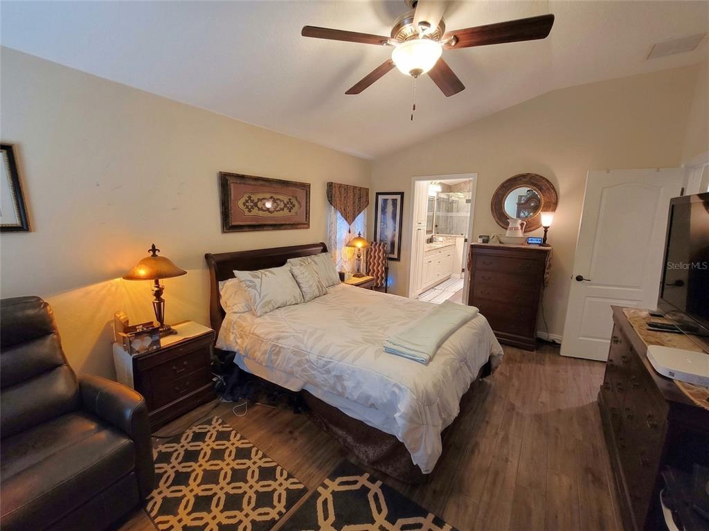 1001 Torreya Way Odessa, FL 33556 - Photo 33 of 44 a bedroom with bed and a tv