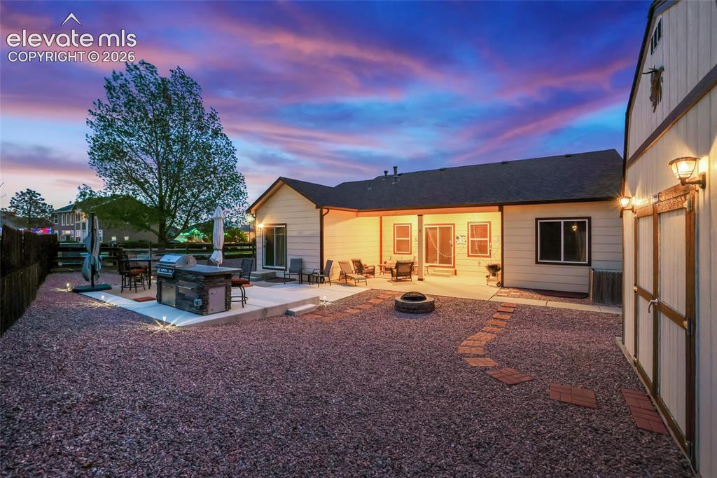 12266 Crystal Downs Road Peyton, CO 80831 - Photo 48 of 50 Backyard twighlight