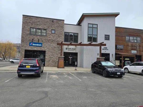 a car parked in front of a building