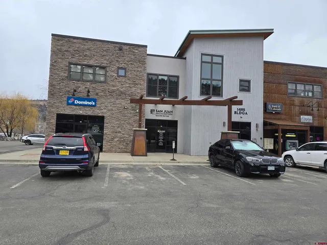 a car parked in front of a building