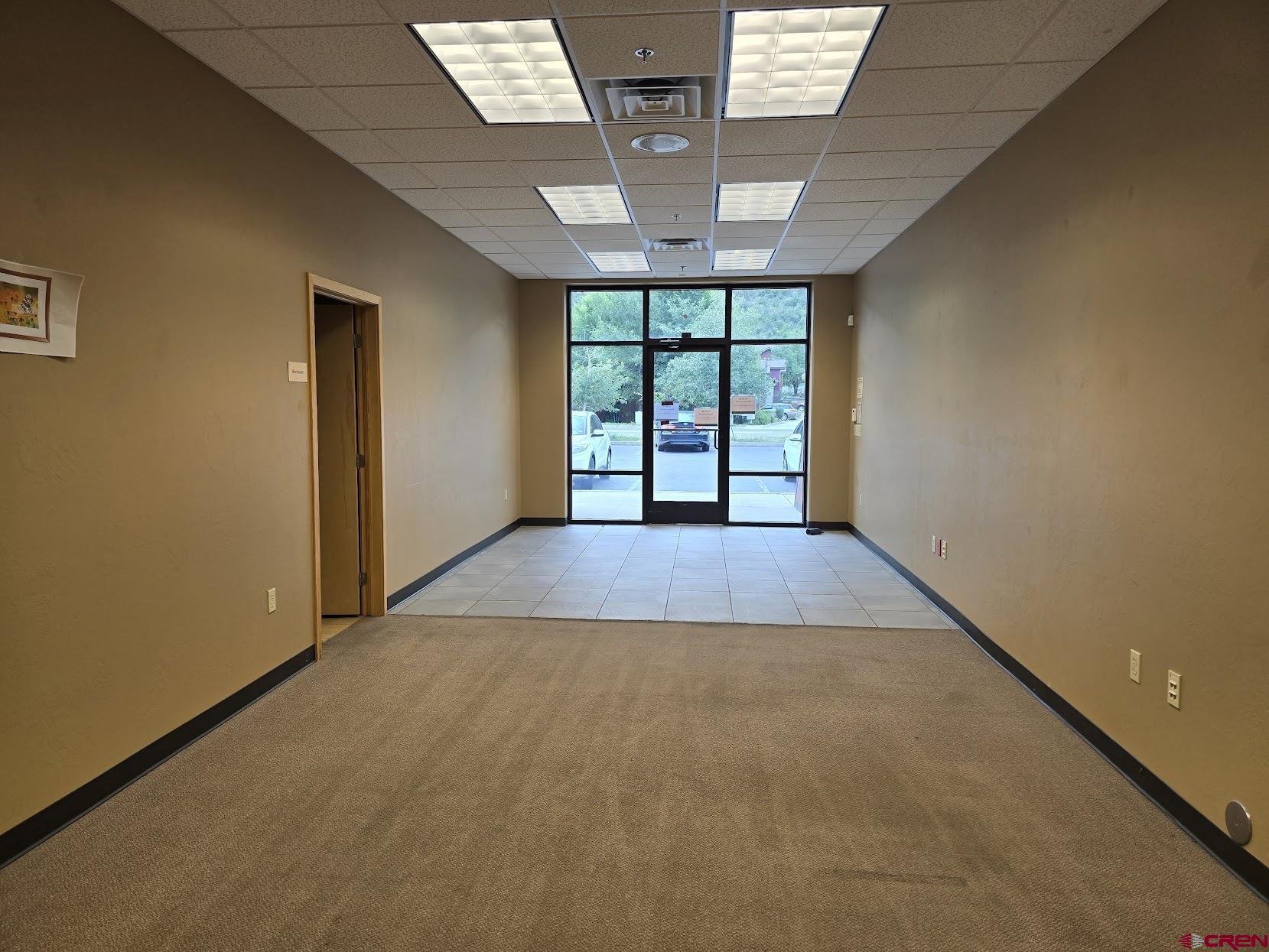 1485 Florida Road, Unit EAST ANIMAS VILLAGE Durango, CO 81301 - Photo 4 of 22 an empty room with windows