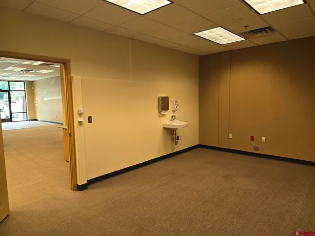 an empty room with a door