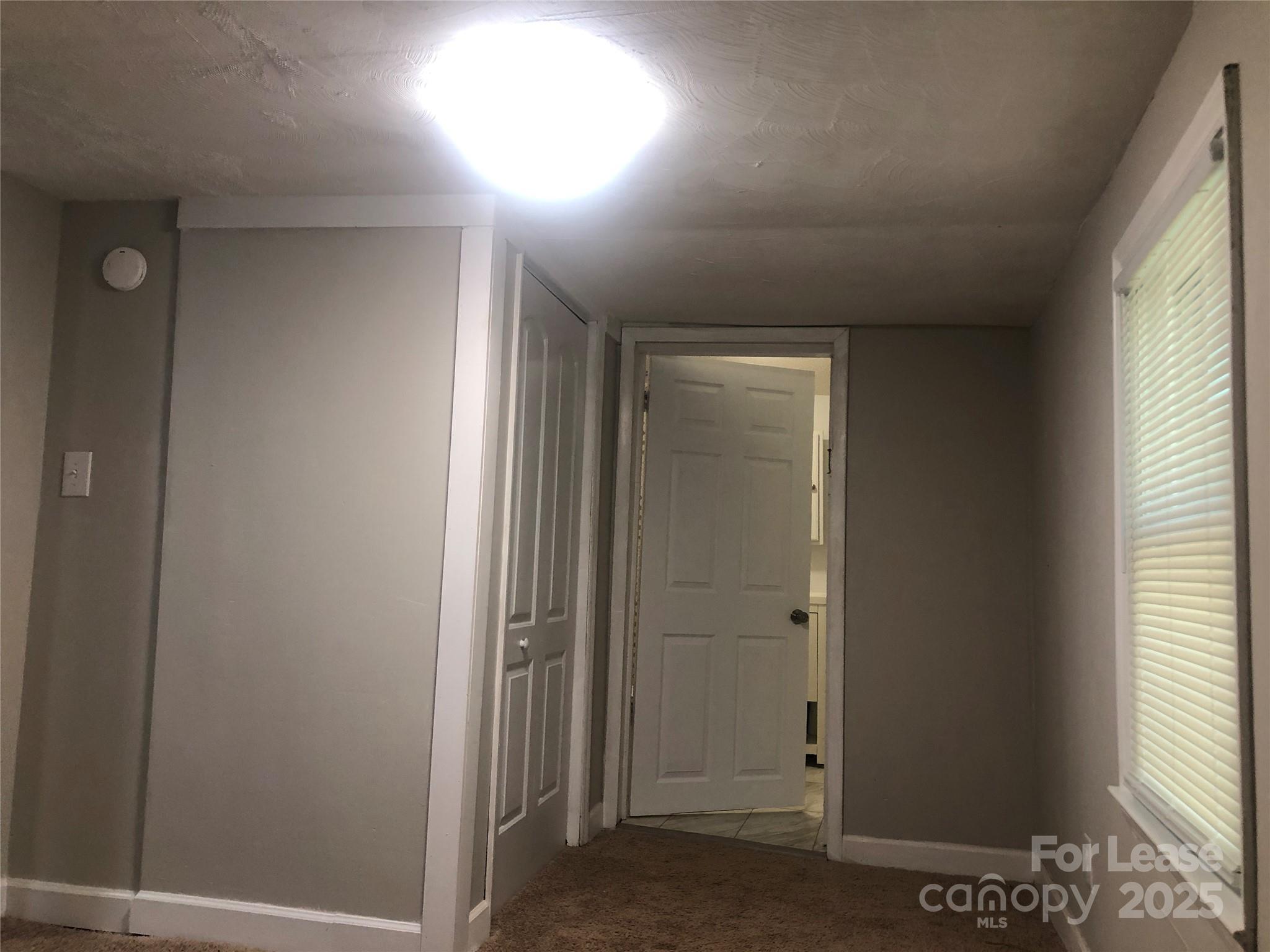 140 Winget Circle Gastonia, NC 28054 - Photo 9 of 16 an empty room with windows