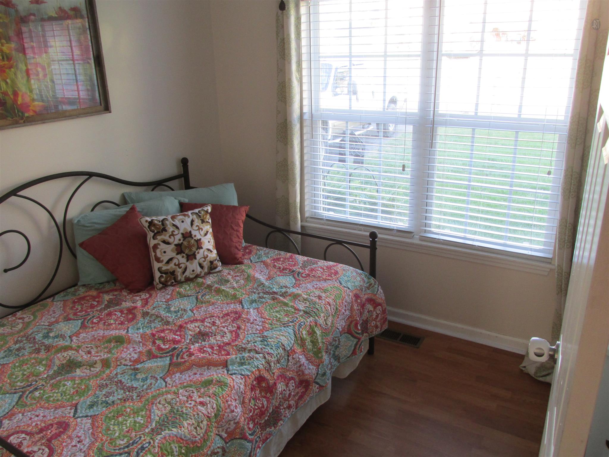 105 Tices Spring Court Dickson, TN 37055 - Photo 12 of 29 a bedroom with a bed and a window