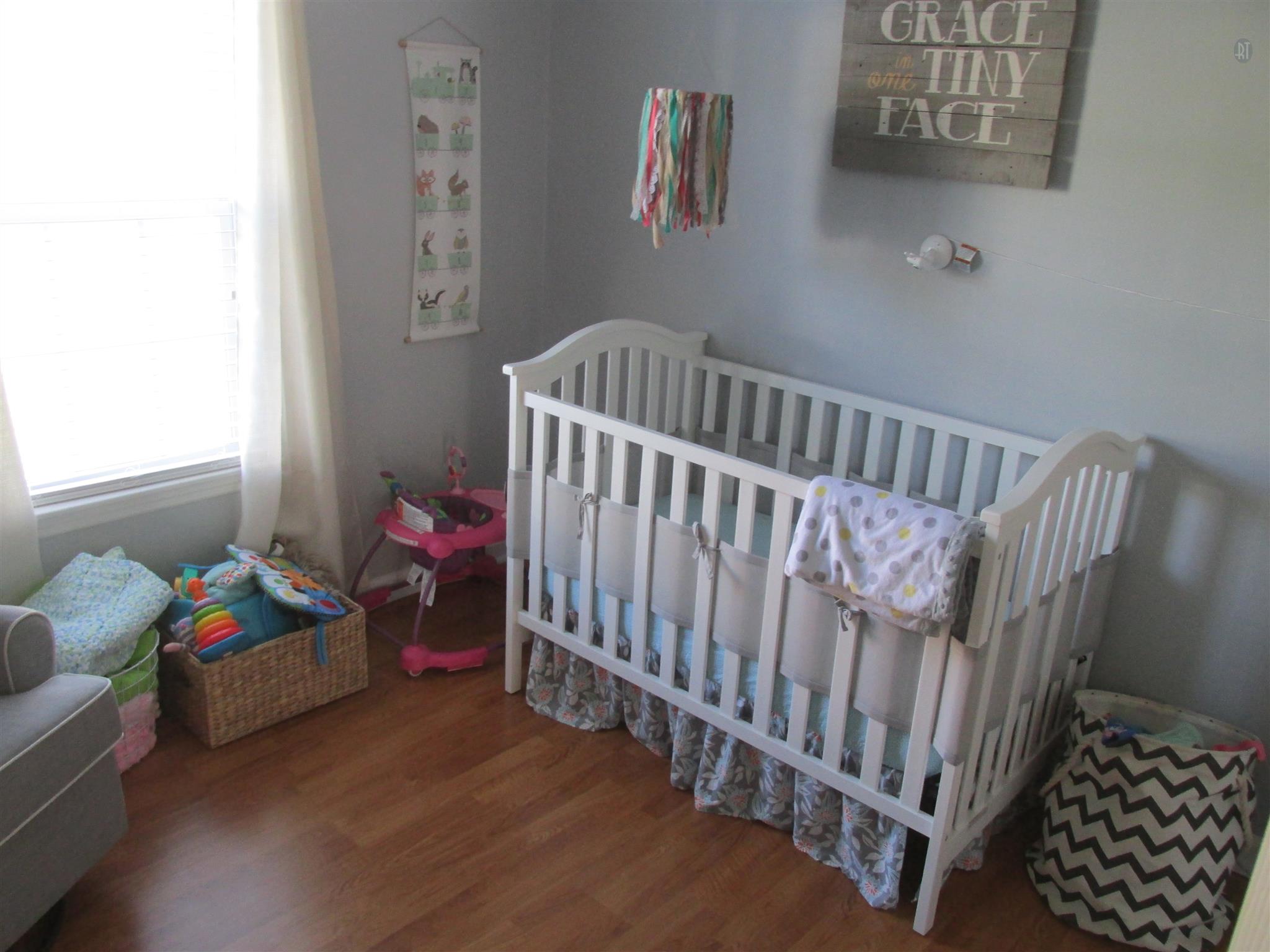 105 Tices Spring Court Dickson, TN 37055 - Photo 13 of 29 a bedroom with furniture and a window