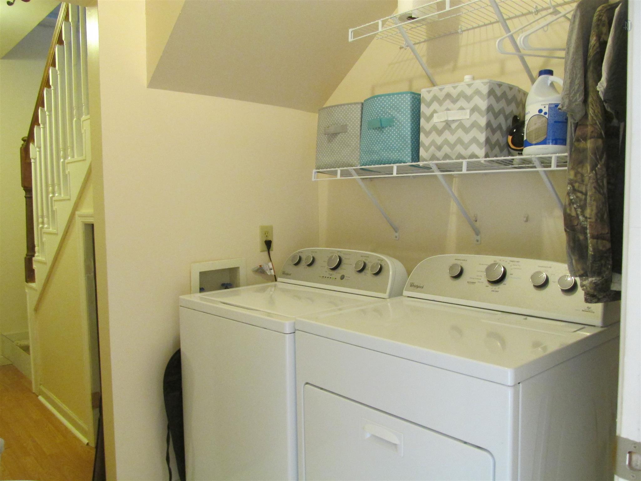 105 Tices Spring Court Dickson, TN 37055 - Photo 18 of 29 a utility room with dryer and washer