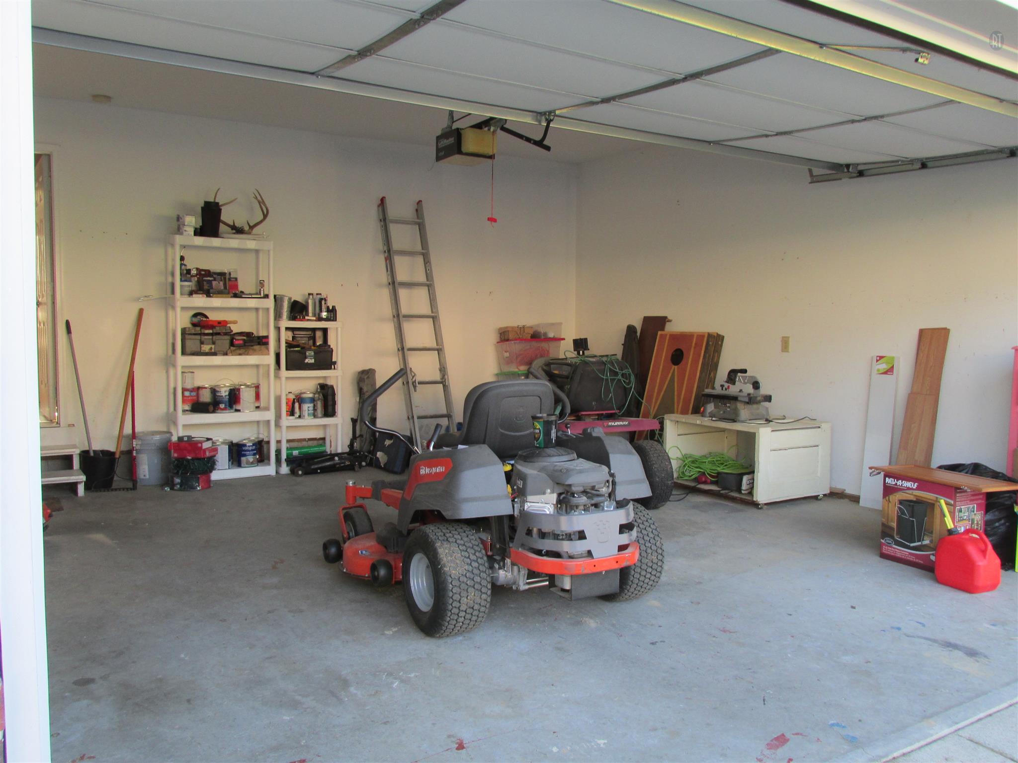 105 Tices Spring Court Dickson, TN 37055 - Photo 19 of 29 a view of a room with lots of white furniture and a chandelier