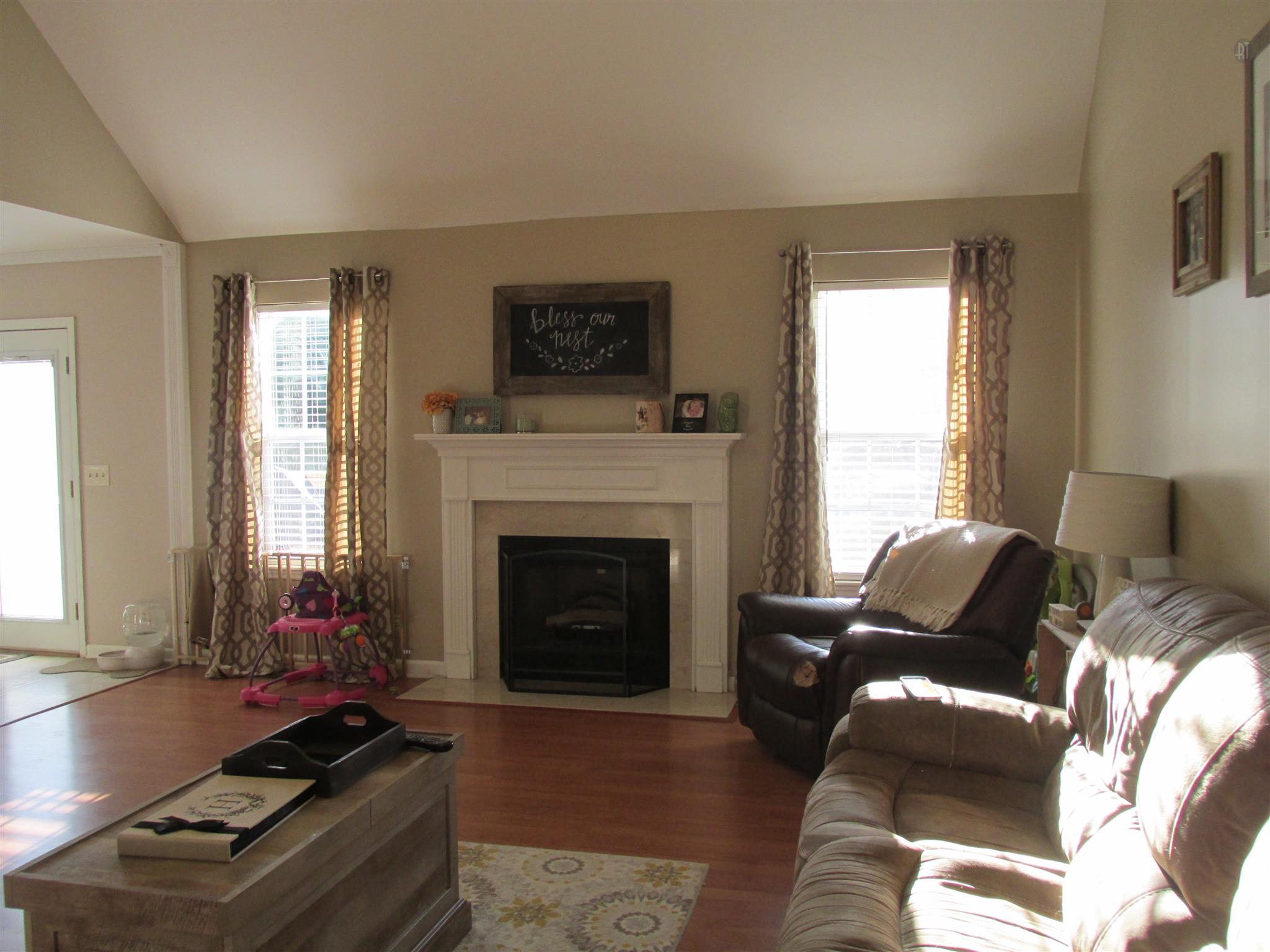 105 Tices Spring Court Dickson, TN 37055 - Photo 3 of 29 a living room with furniture and a fireplace