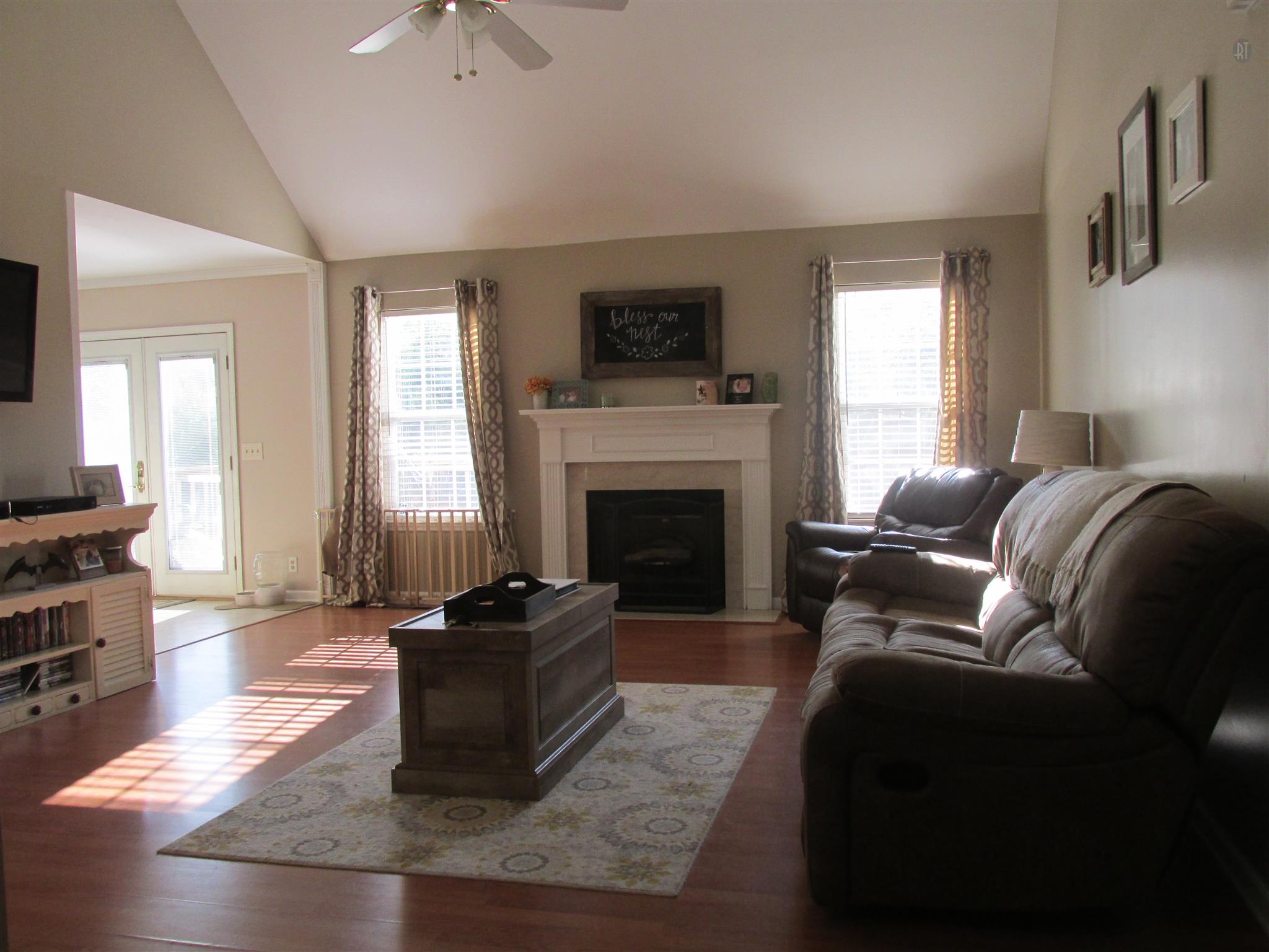 105 Tices Spring Court Dickson, TN 37055 - Photo 5 of 29 a living room with furniture and a fireplace