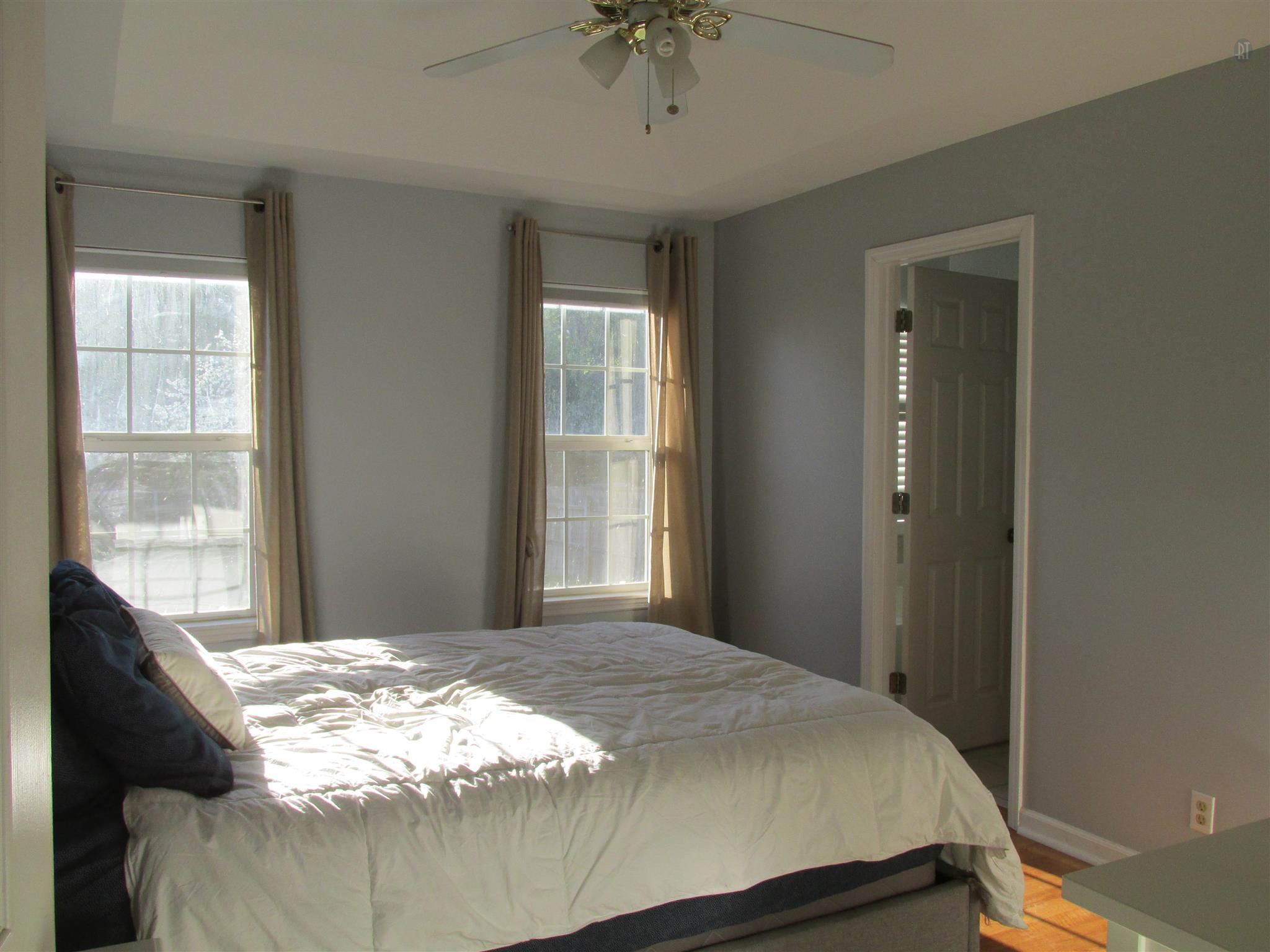 105 Tices Spring Court Dickson, TN 37055 - Photo 9 of 29 a bedroom with a bed and a window