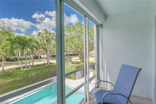 a view of a room with backyard and porch