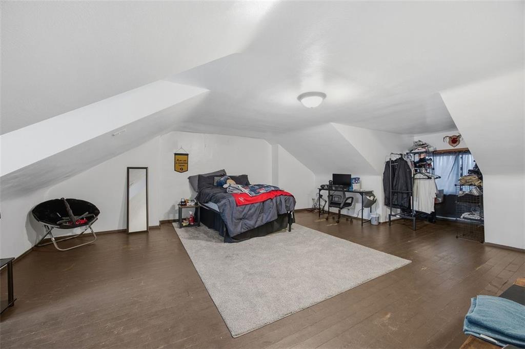 78 South 14th Street Pittsburgh, PA 15203 - Photo 25 of 35 a living room with furniture and a gym machine