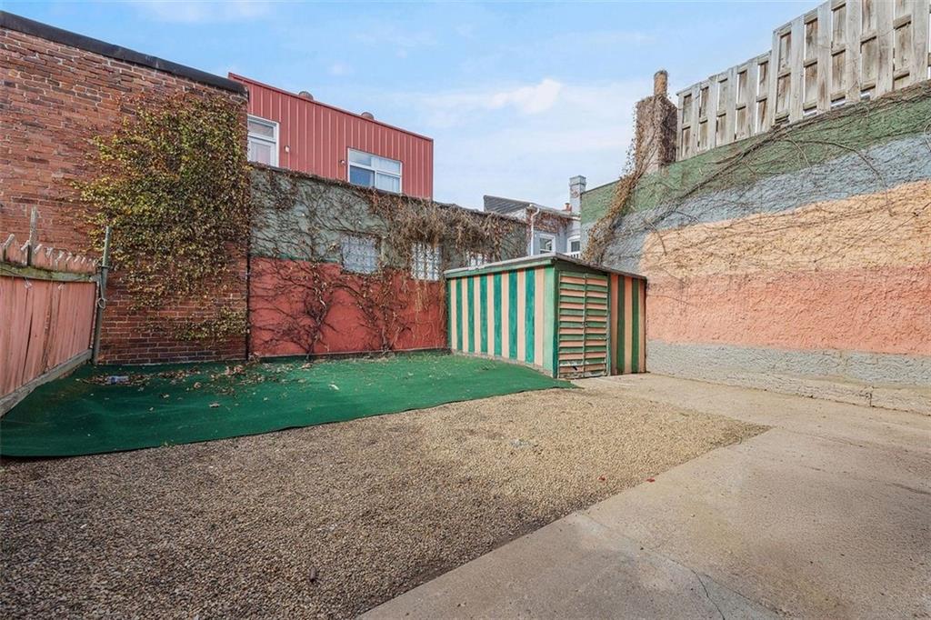 78 South 14th Street Pittsburgh, PA 15203 - Photo 4 of 35 a view of a house with a yard and plants