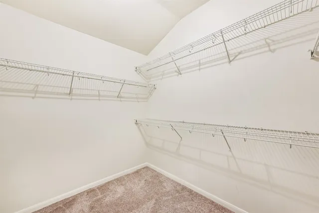 a view of a room with racks on the wall