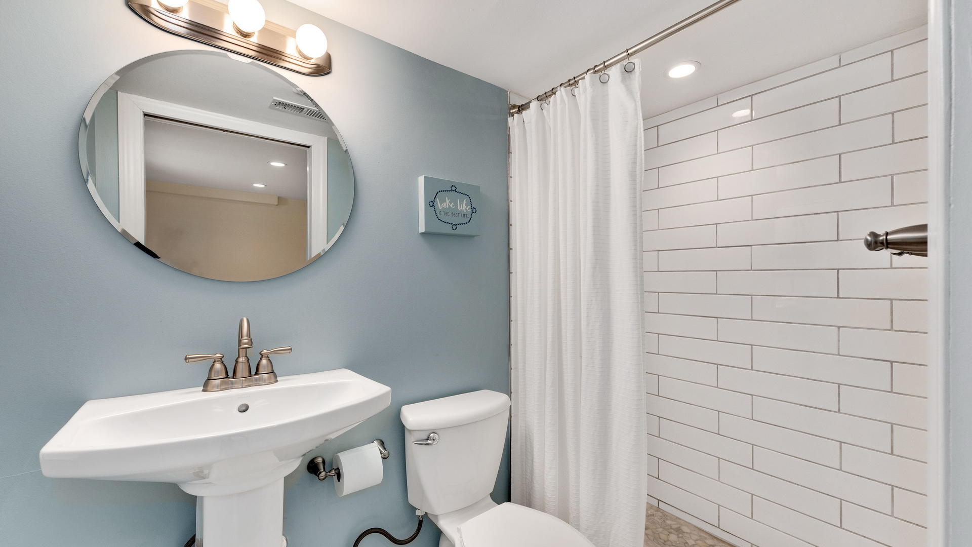 3929 Wolf Road Western Springs, IL 60558 - Photo 22 of 26 a bathroom with a sink mirror and toilet